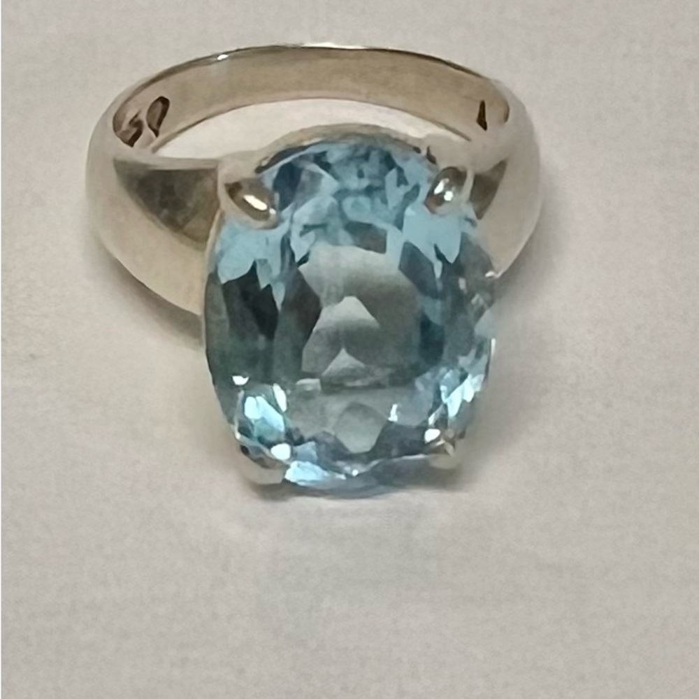 Blue stone and sterling silver band.